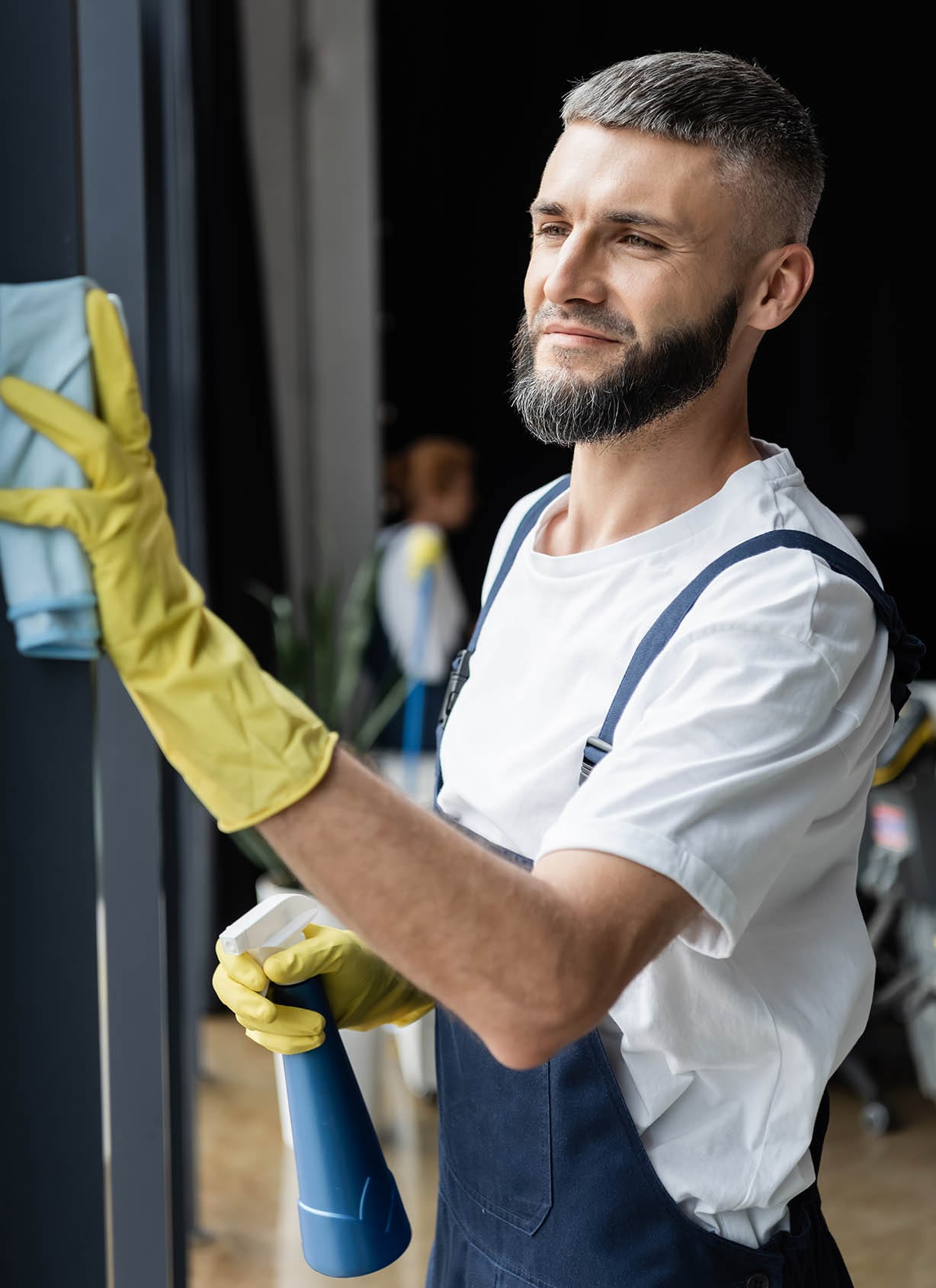 bearded man cleaning