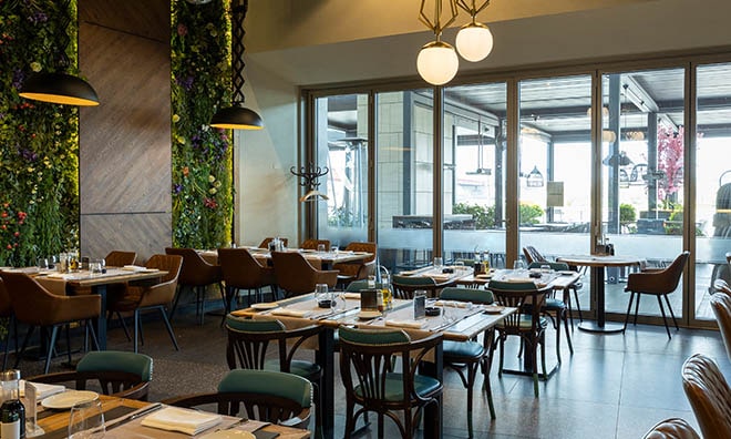 clean restaurant interior with arranged tables and chairs